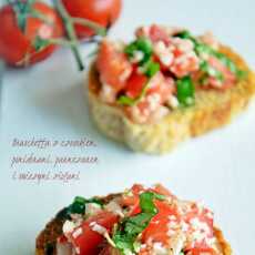 Przepis na Bruschetta z pomidorami, czosnkiem, świeżymi ziołami i parmezanem