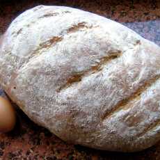 Przepis na Duży chleb pszenny z dodatkiem mąki żytniej z siemieniem lnianym.