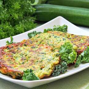 Zucchini pancakes with curly kale