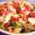Sałatka z gorgonzolą,winogronami gruszką i orzechami na rukoli