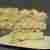 Tort bezowy z masłem orzechowym i powidłami śliwkowymi