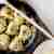 Wyśmienite, oryginalnie podane pierogi z kapustą i grzybami zasmażane z orzechami pekan serem pleśniowym i cebulką