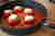 Papryki faszerowane kaszą jaglaną w sosie pomidorowym, pieczone w patelni Woll