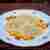Ravioli z serem i śliwką. Podane z kaki i orzechami włoskimi
