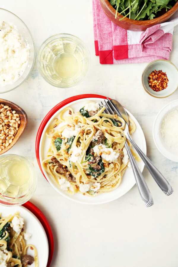 Creamed Spinach Pasta with Sausage and Pine Nuts